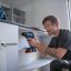 Bosch GSR 18V-45+GWS 18V-8 aku sada nářadí 18V 2x 4Ah 0615A5007N